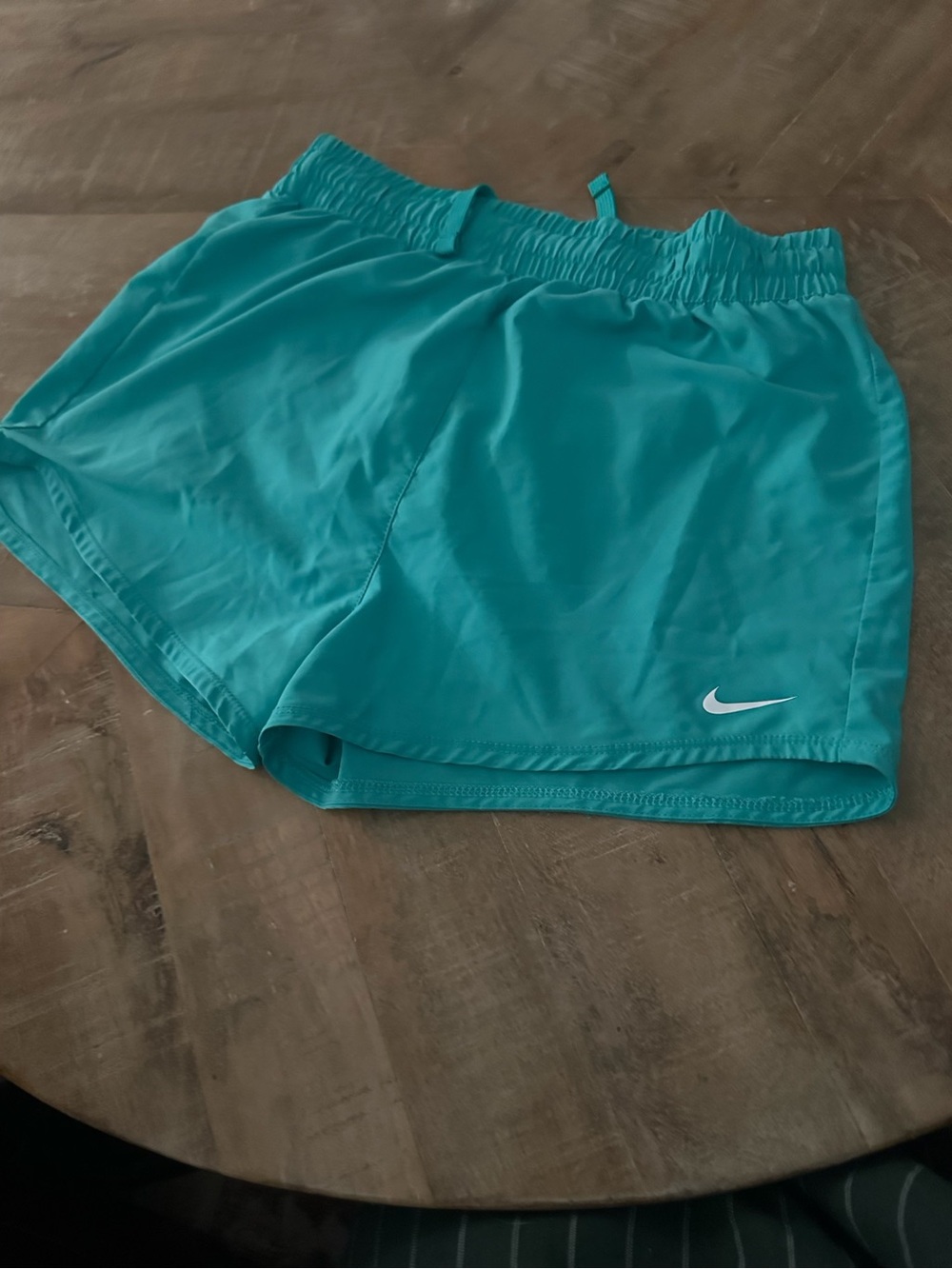 Nike Teal Running Shorts with White Swoosh